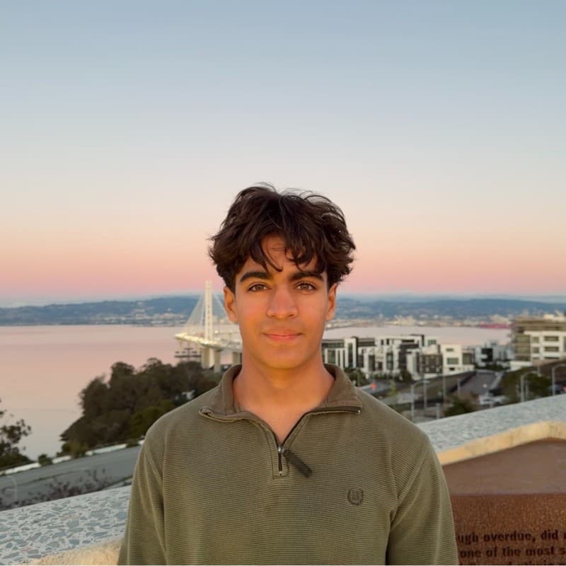 Shlok Jadhav overlooking the Bay Bridge at sunset